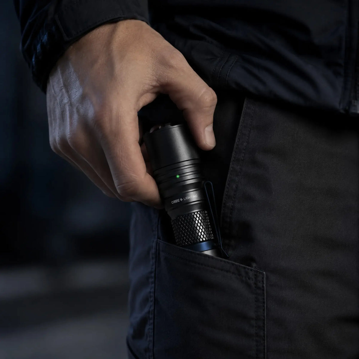 Cree Lighting X14 compact EDC tactical flashlight clipped into pocket for quick access