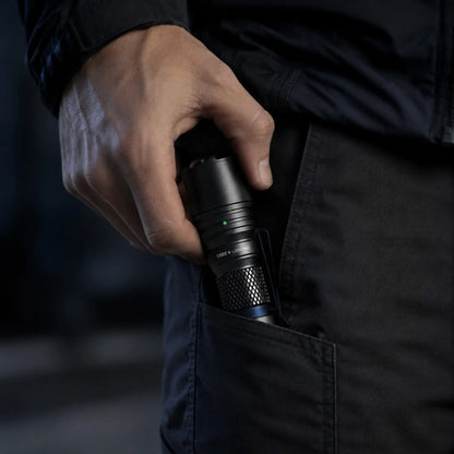 Cree Lighting X14 compact EDC tactical flashlight clipped into pocket for quick access